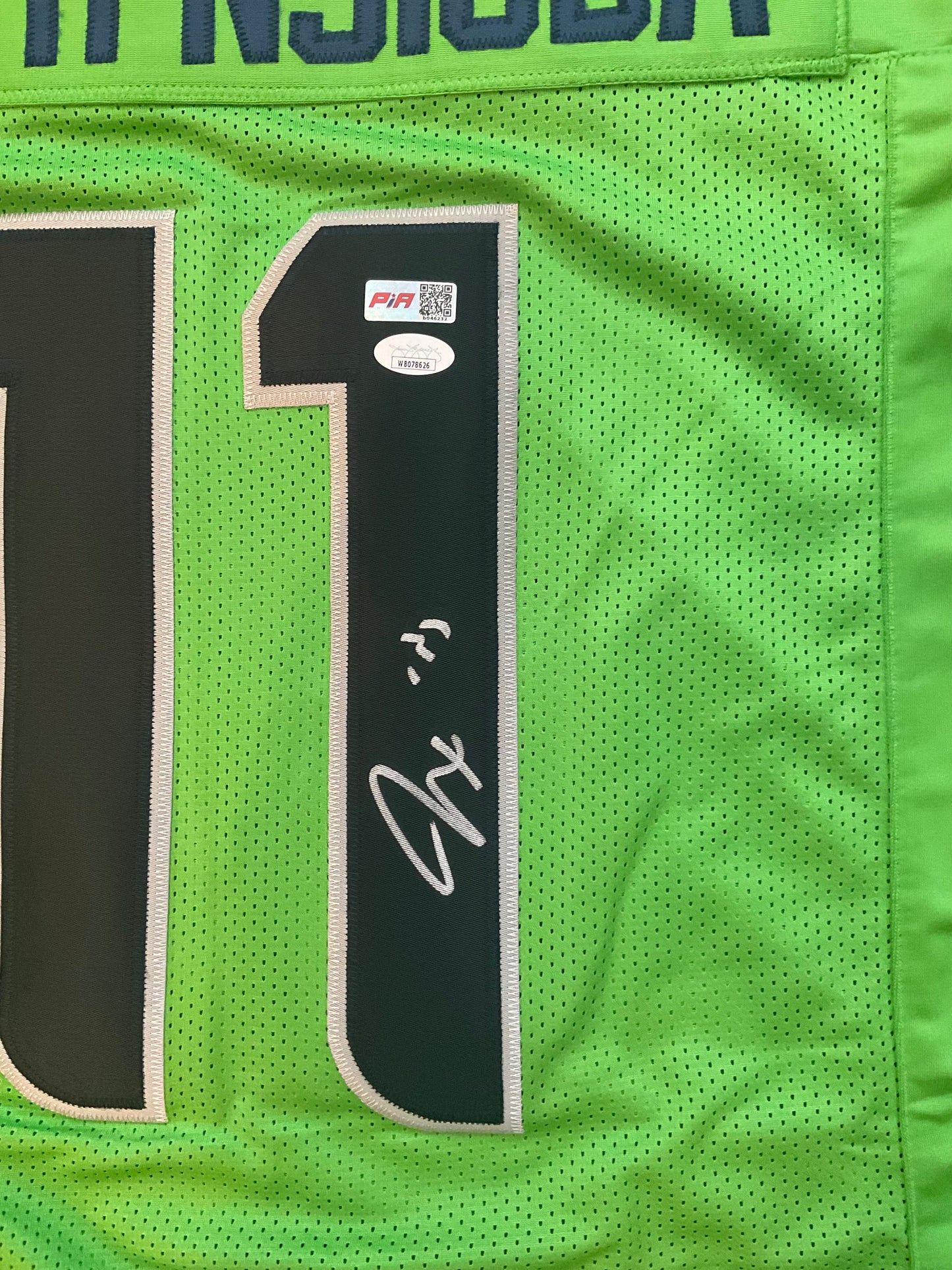Jaxon Smith-Njigba Signed Seattle Green Football Jersey (JSA & PIA)