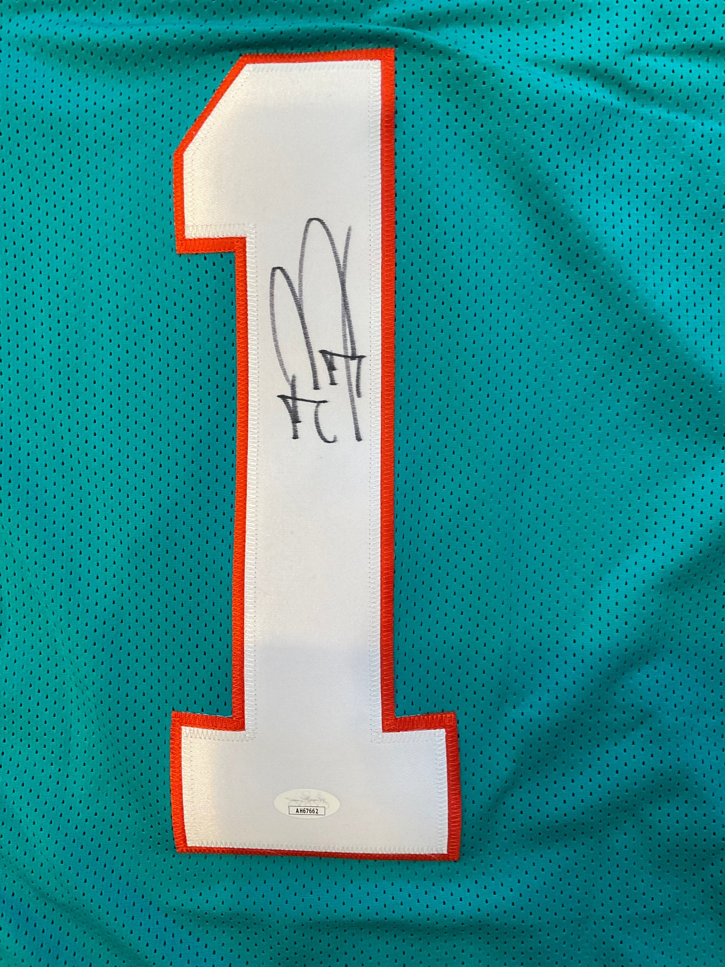 Tua Tagovailoa Custom Miami Autographed Football Jersey (JSA)